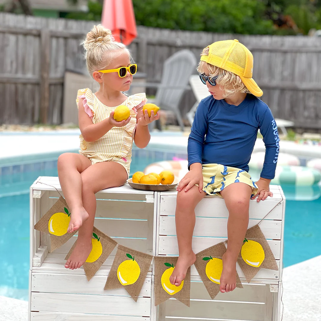 RuffleButts Baby Seersucker Rash Guard Bikini with Roshambo Yellow Sunglasses - Image 7